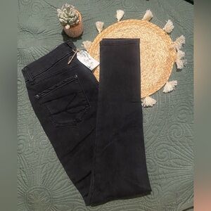 Woman’s black jeans